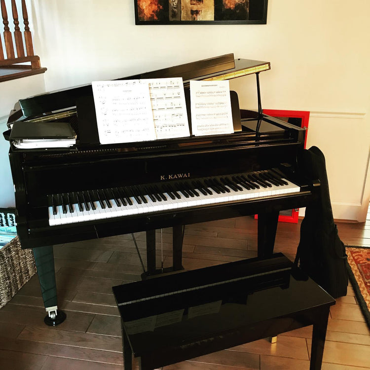 Kawai Grand PIano in home with sheet music